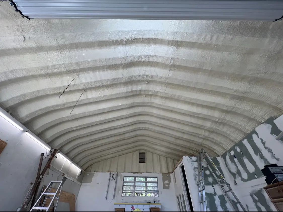 Spray polyurethane foam applied to the underside of a metal roof deck in Wallkill